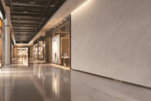 Empty Storefront with Large Blank Sign in Modern Shopping Mall